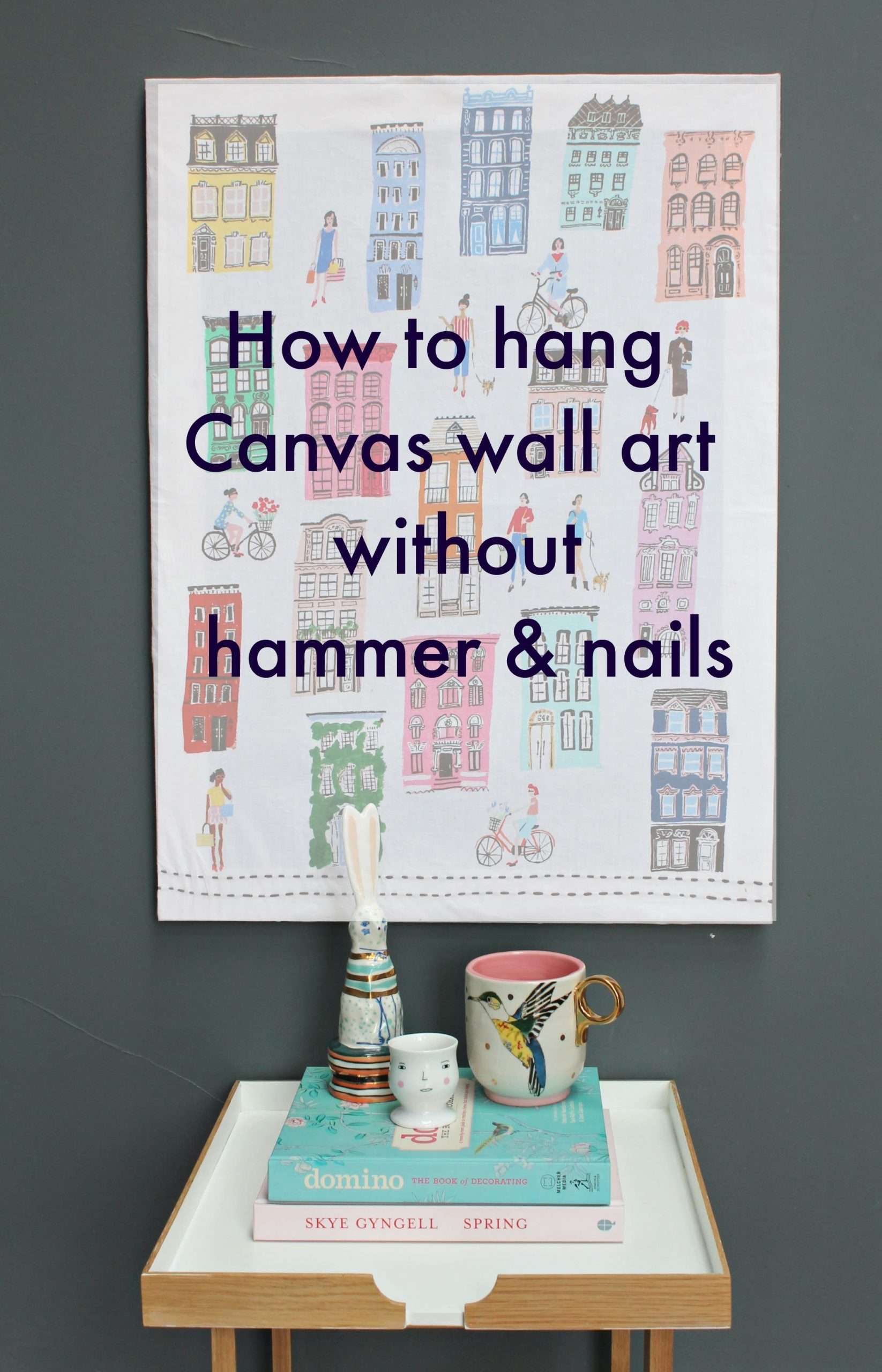 Hang a canvas on a wall without hammer and nails