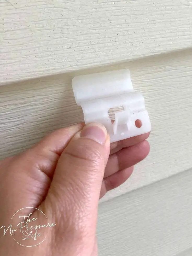 How to Hang Things on Vinyl Siding Without Damaging Your Home